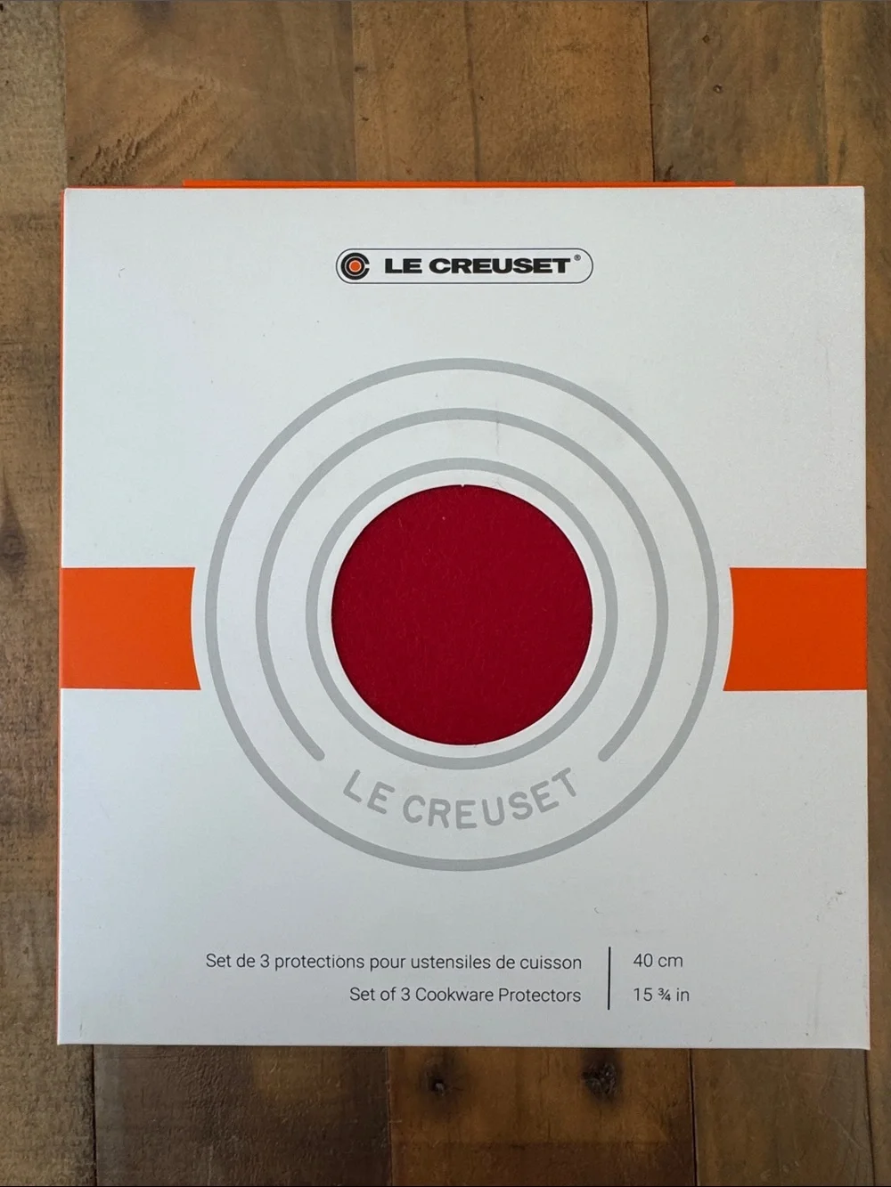 Le Creuset cleaning brush, three cookware protectors, 8 oz cleaner & protector